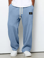 Pantalon homme texture gaufrée, coupe droite, dix coloris, bleu ciel