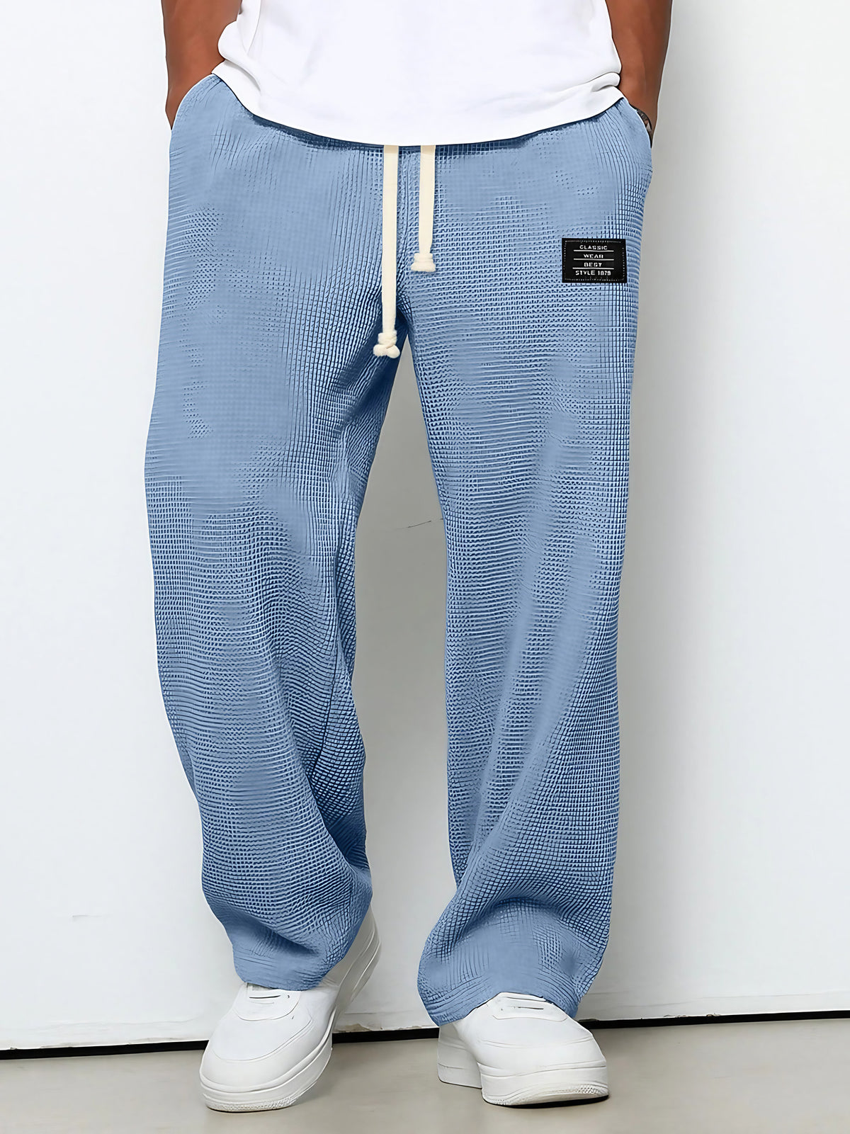 Pantalon homme texture gaufrée, coupe droite, dix coloris, bleu ciel