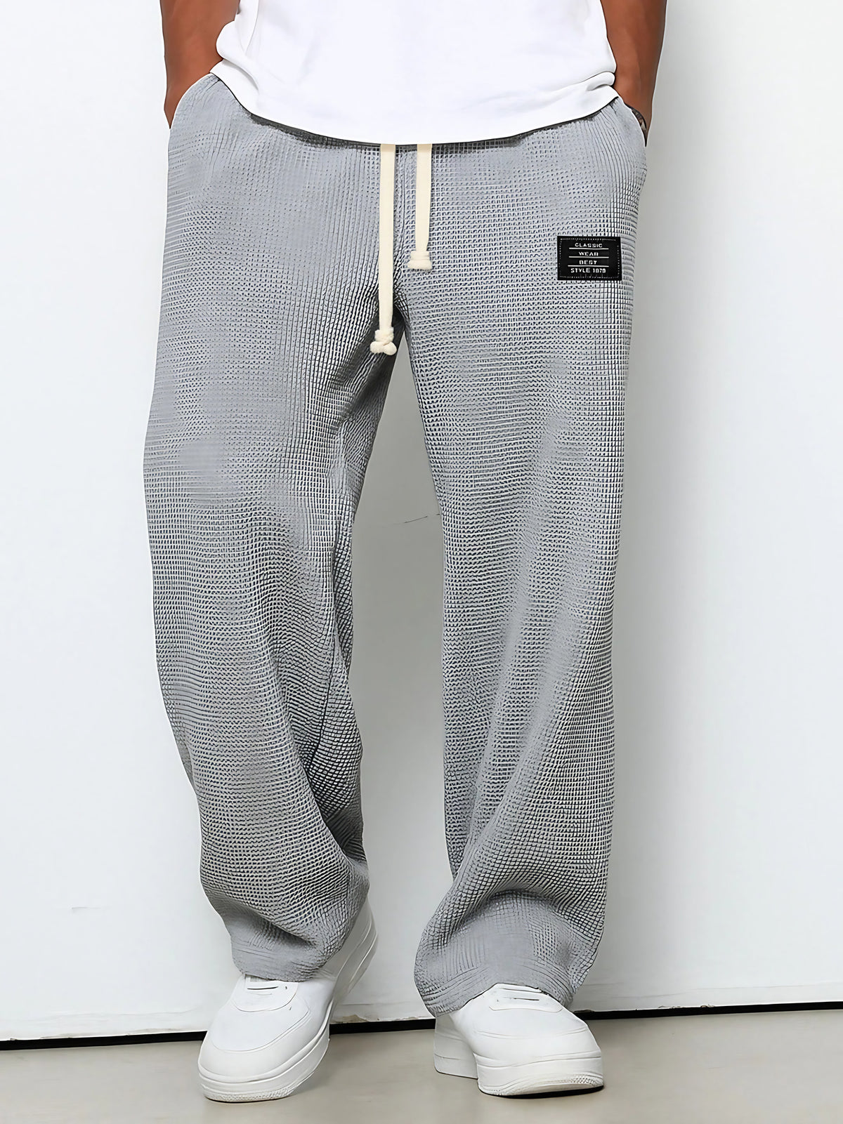 Pantalon homme texture gaufrée, coupe droite, dix coloris, gris