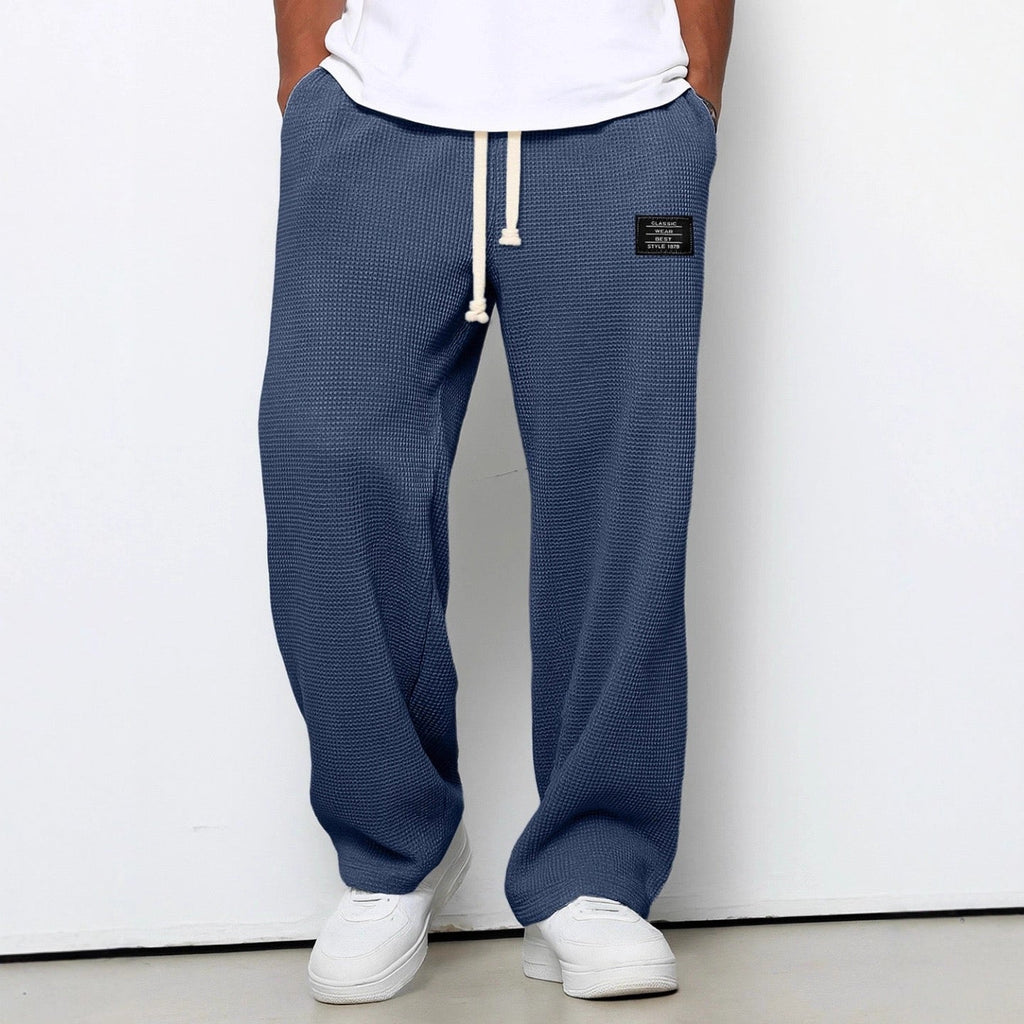 Pantalon homme texture gaufrée, coupe droite, dix coloris, bleu