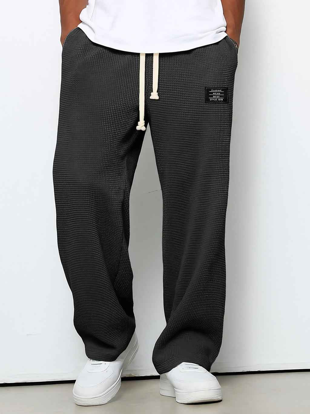 Pantalon homme texture gaufrée, coupe droite, dix coloris, noir
