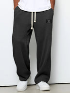 Pantalon homme texture gaufrée, coupe droite, dix coloris, noir
