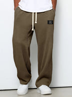 Pantalon homme texture gaufrée, coupe droite, dix coloris, marron foncé