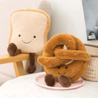 Peluche en forme de pain, croissant, baguette, bretzel ou œuf