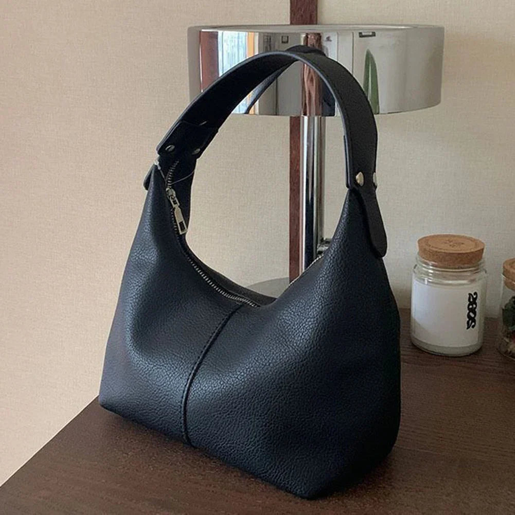 Petit sac porté épaule femme, forme arrondie, similicuir retourné