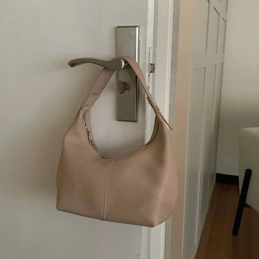 Petit sac porté épaule femme, forme arrondie, similicuir retourné
