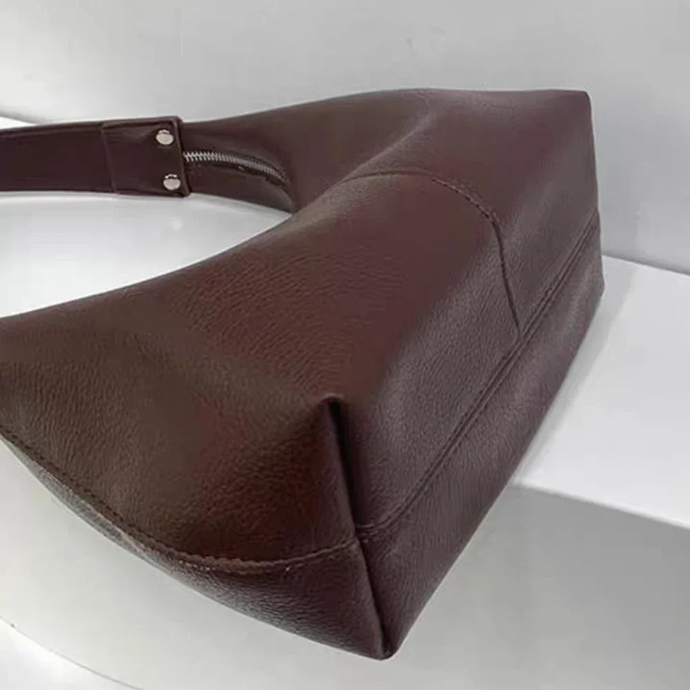 Petit sac porté épaule femme, forme arrondie, similicuir retourné