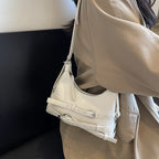 Petit sac trapèze femme en similicuir lisse, style rock