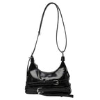 Petit sac trapèze femme en similicuir lisse, style rock, noir