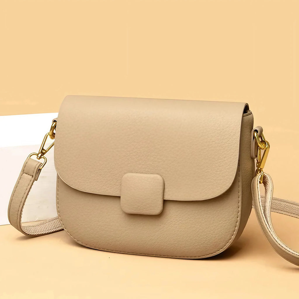 Petit sac à main beige aux lignes arrondies, bandoulière amovible