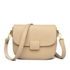 Petit sac à main beige aux lignes arrondies, bandoulière amovible, beige