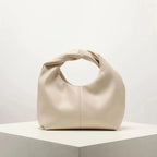Petit sac à main femme arrondi, anse à maillons dorés, beige