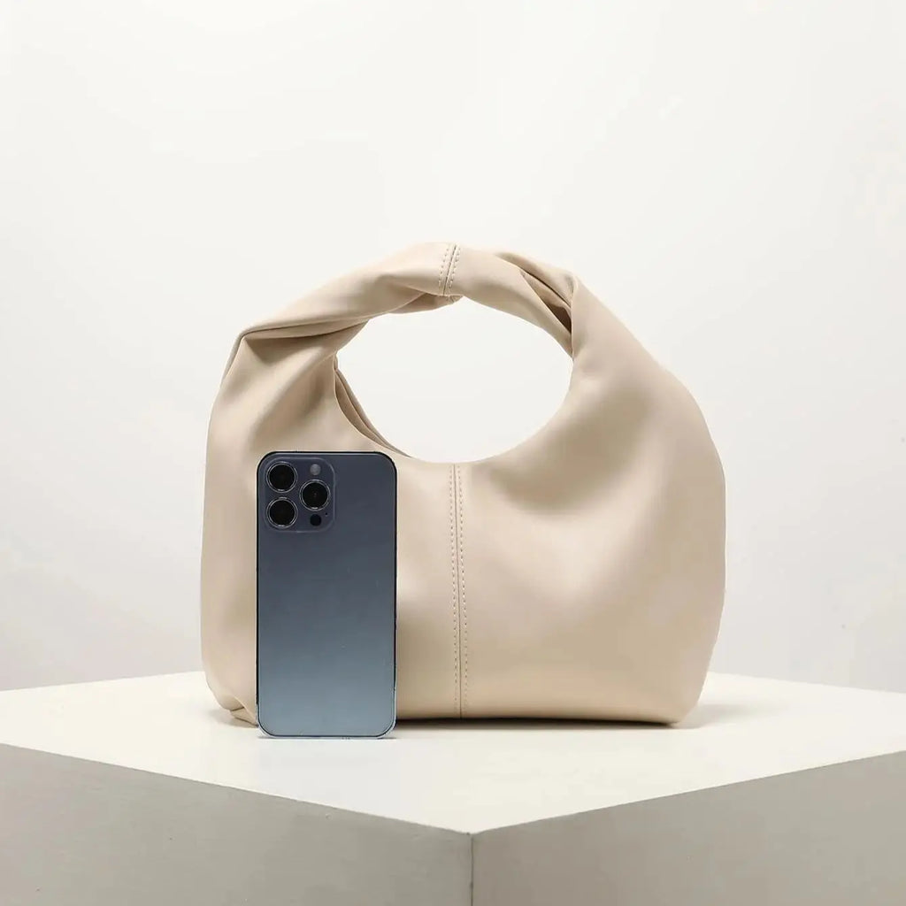 Petit sac à main femme arrondi, anse à maillons dorés