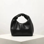 Petit sac à main femme arrondi, anse à maillons dorés, noir