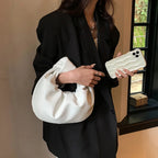Petit sac à main femme arrondi, anse à gros nœud, en similicuir