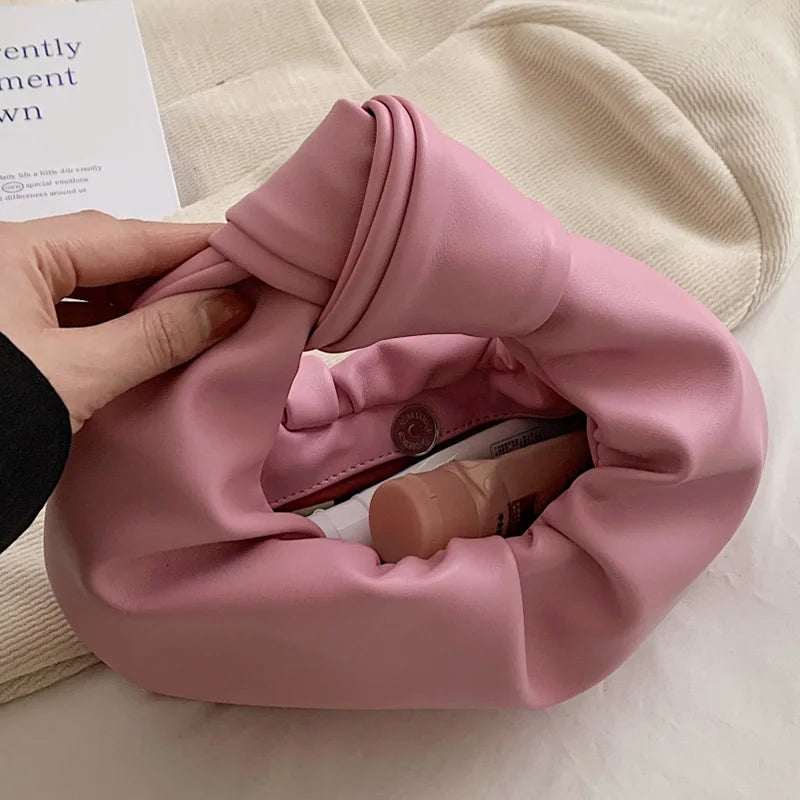 Petit sac à main femme arrondi, anse à gros nœud, en similicuir