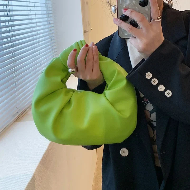 Petit sac à main femme arrondi, anse à gros nœud, en similicuir