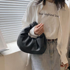 Petit sac à main femme arrondi, anse à gros nœud, en similicuir