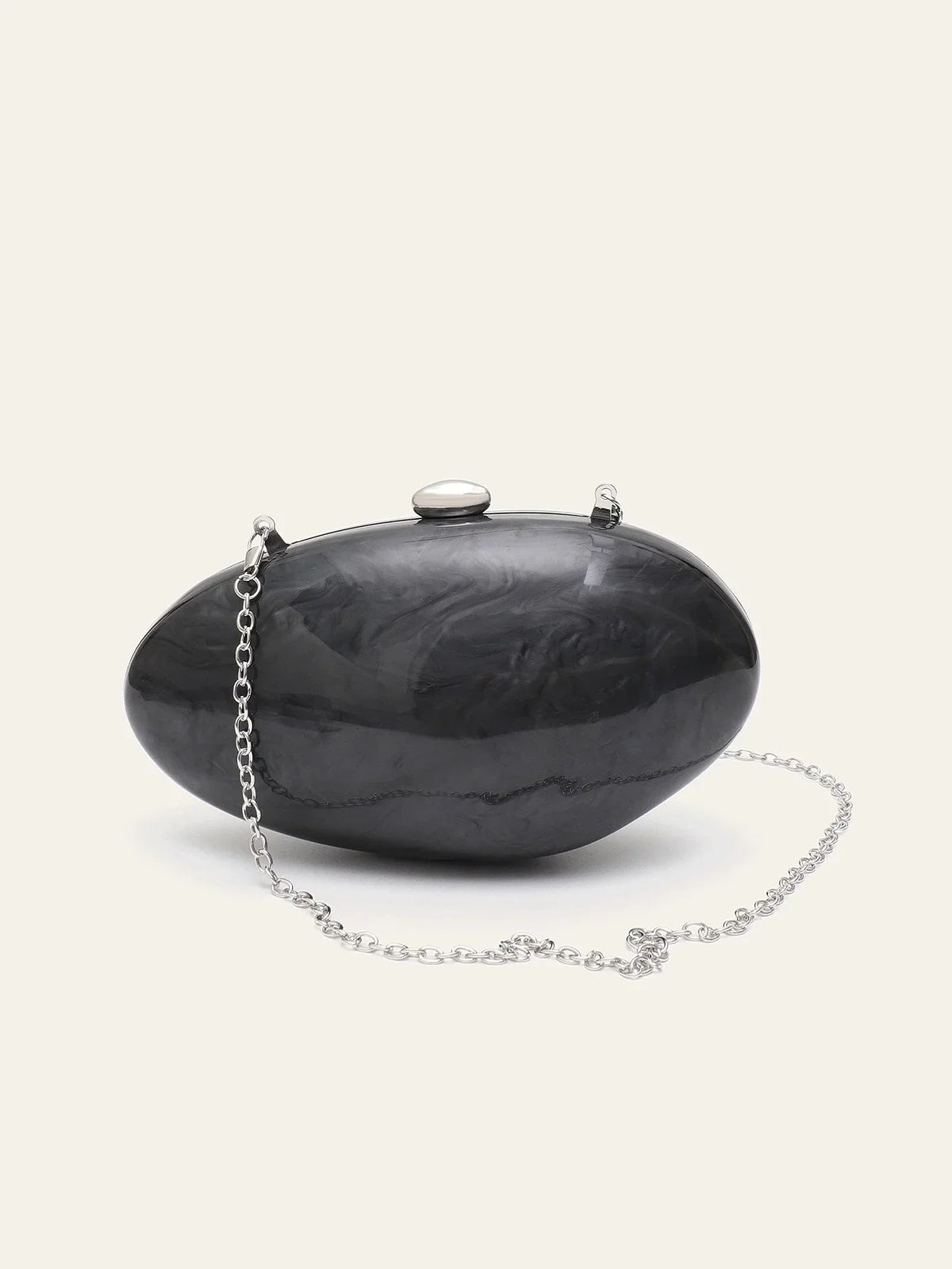 Pochette de cérémonie femme forme arrondie, chaîne dorée