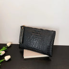 Pochette de soirée noire femme à dragonne, 27 x 17 cm