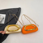 Pochette de soirée femme arrondie, chaîne dorée amovible