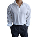 Polo homme à manches longues, col et poignets boutonnés, gris clair