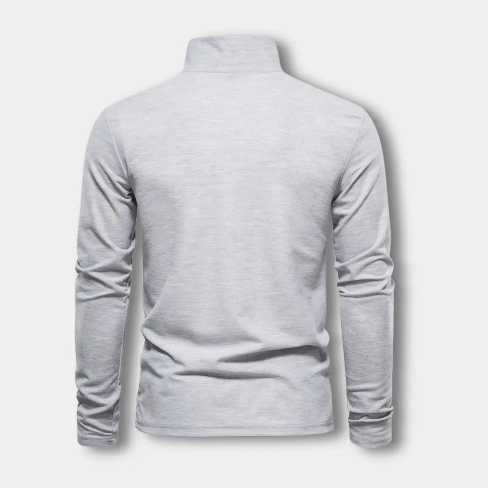 Polo homme à manches longues, col contrasté, trois boutons