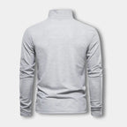 Polo homme à manches longues, col contrasté, trois boutons