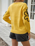 Pull femme col rond à manches brodées de fleurs, du S au 2XL