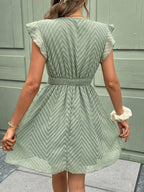Robe d'été courte femme à bordures crochetées, col V
