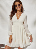 Robe à pois femme évasée, manches longues voilées, blanc