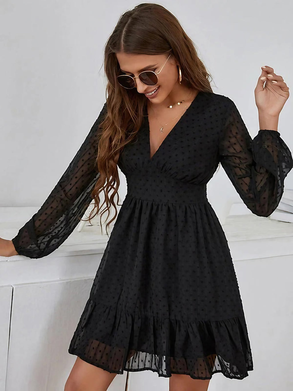 Robe à pois femme évasée, manches longues voilées, noir