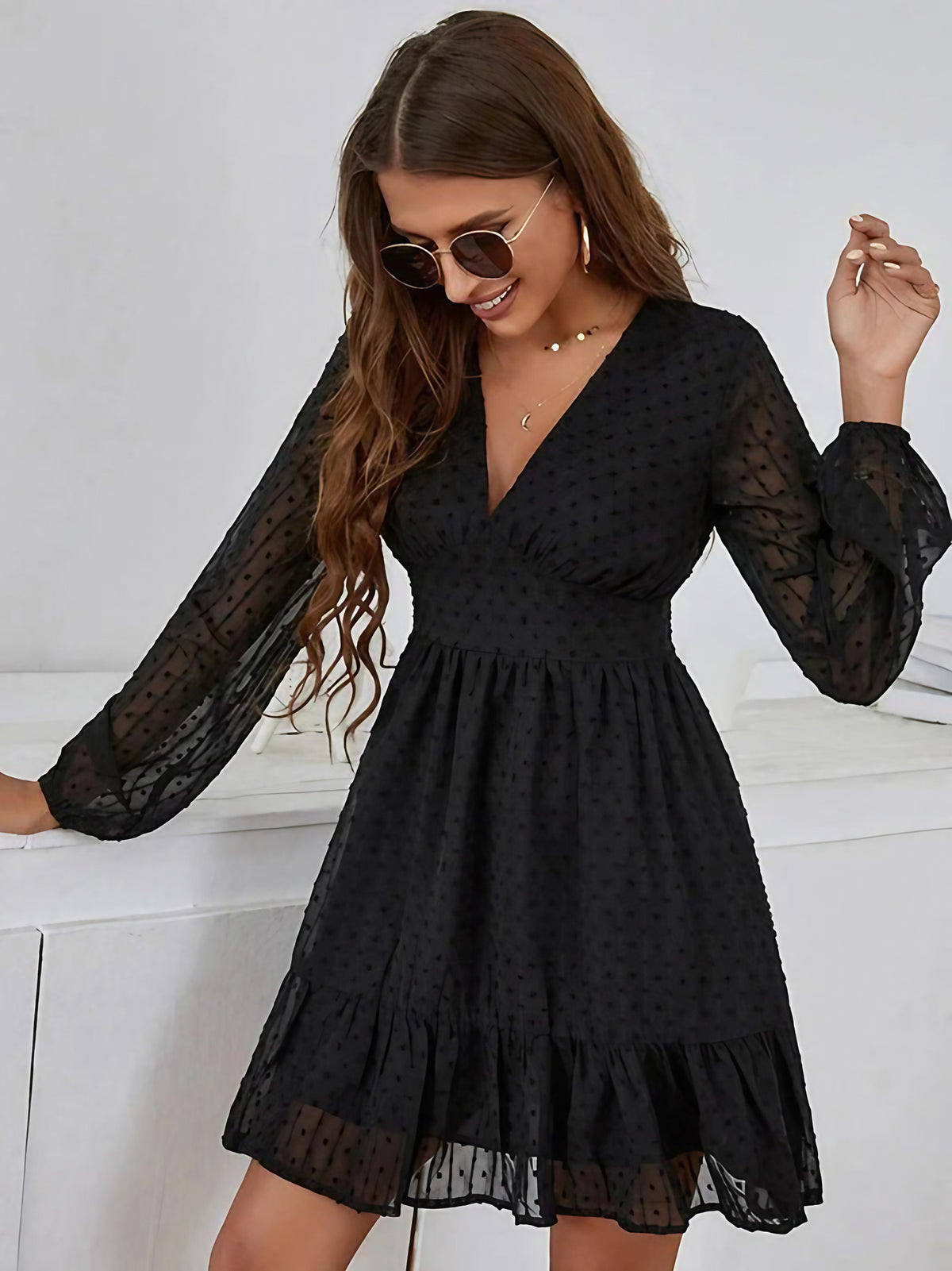 Robe à pois femme évasée, manches longues voilées, noir
