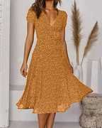 Robe longue en mousseline fleurie, col V, coupe ample et fluide, jaune