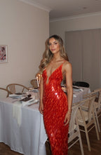 Robe longue à paillettes rouge, dos nu, coupe ajustée
