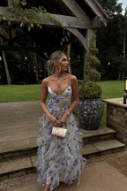 Robe longue fleurie bleue à bretelles, volants et dos nu