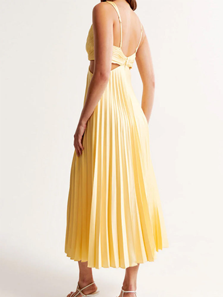 Robe longue évasée jaune, col V, dos nu et jupe plissée