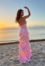 Robe longue fleurie col V à volants, dos décolleté, rose