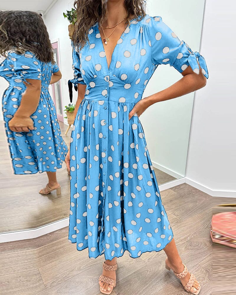 Robe à pois mi-longue, manches nouées et coupe cintrée, bleu clair