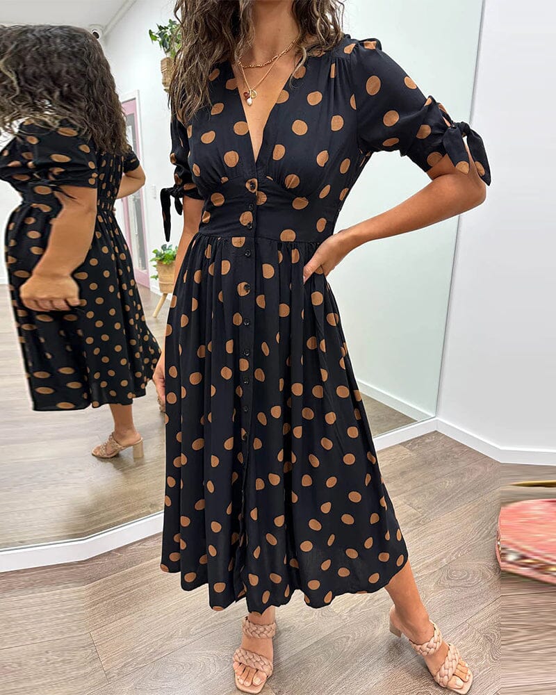 Robe à pois mi-longue, manches nouées et coupe cintrée, noir
