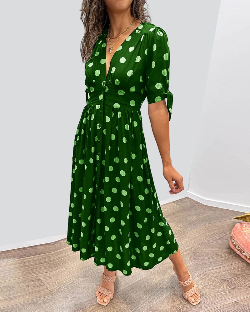 Robe à pois mi-longue, manches nouées et coupe cintrée