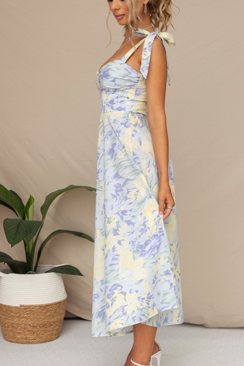 Robe midi fleurie à bretelles nouées, coupe cintrée, deux coloris