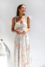 Robe midi fleurie à bretelles nouées, coupe cintrée, deux coloris