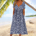 Robe midi fleurie bleue à manches courtes, coupe fluide, bleu fleuri