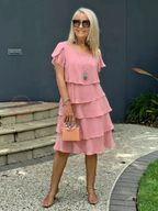 Robe midi fluide à ourlet asymétrique et volants superposés
