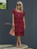 Robe midi fluide à ourlet asymétrique et volants superposés