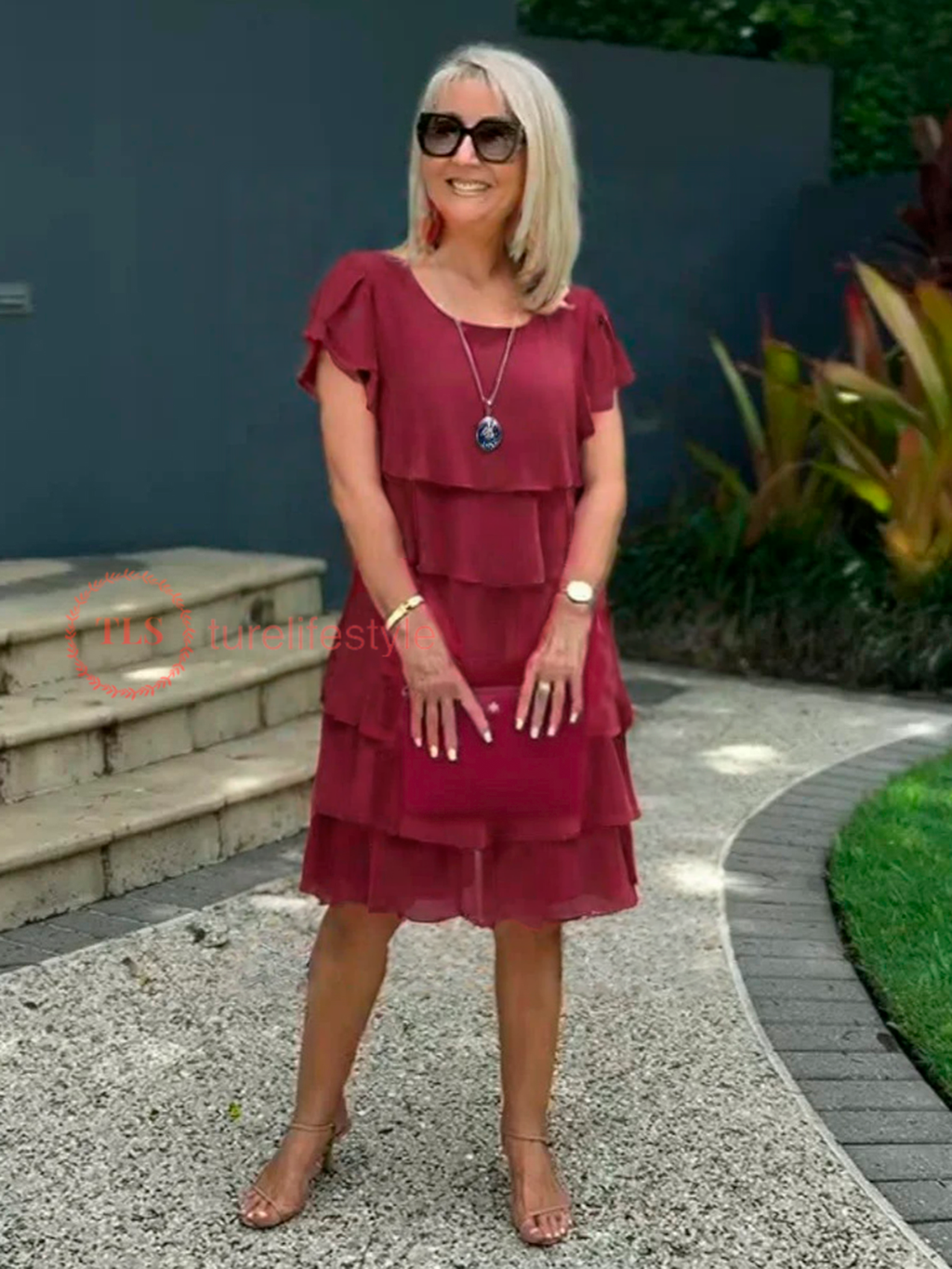 Robe midi fluide à ourlet asymétrique et volants superposés