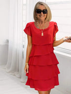 Robe midi fluide à ourlet asymétrique et volants superposés, rouge