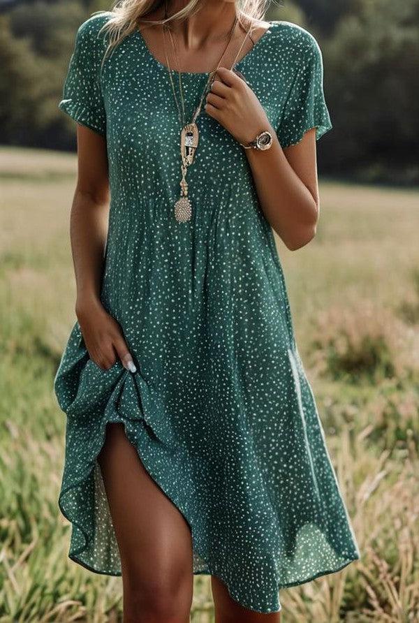Robe midi verte à pois, manches courtes et col rond