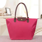 Sac bandoulière femme en trois formats, neuf coloris, rouge rosé